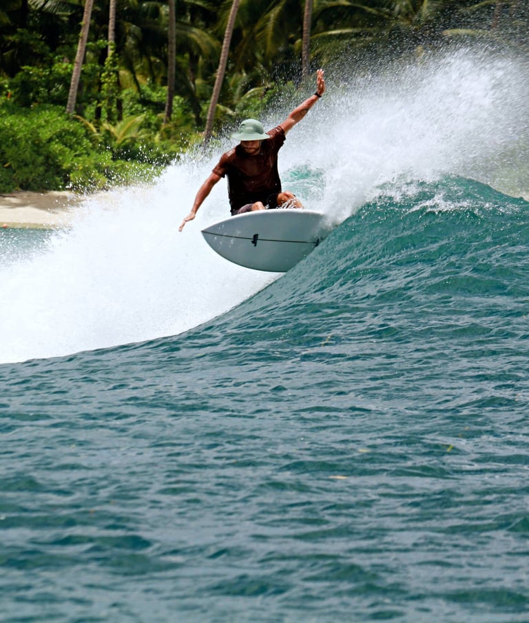 a man riding a surfboard in the ocean