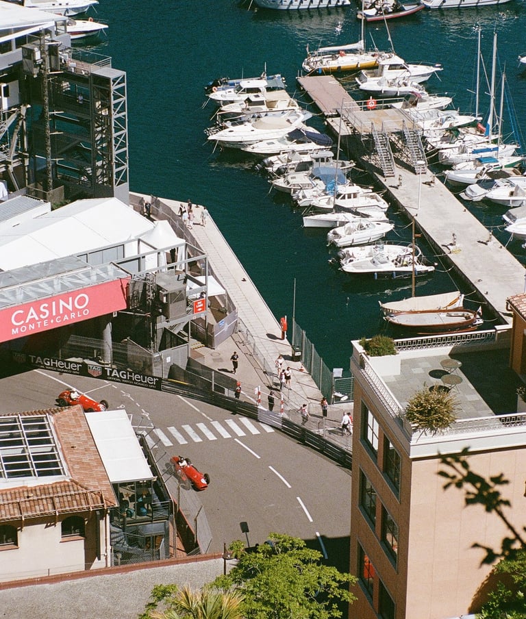 race cars driving on the Monaco Grand Prix circuit