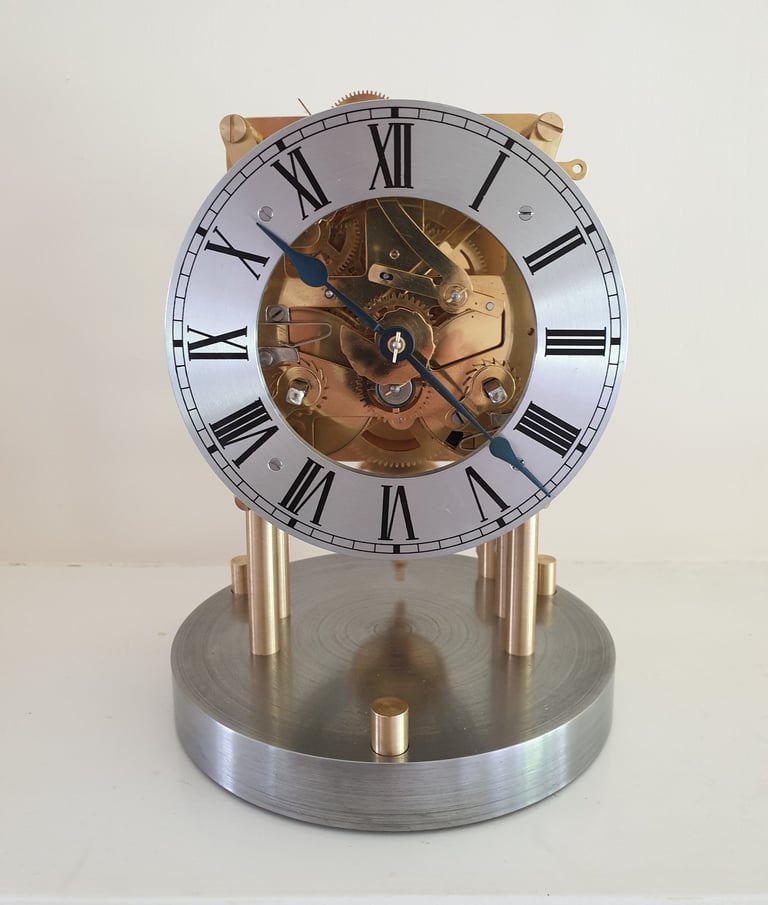 Restored Mantel clock, mounted to give full visiblity to the movement.