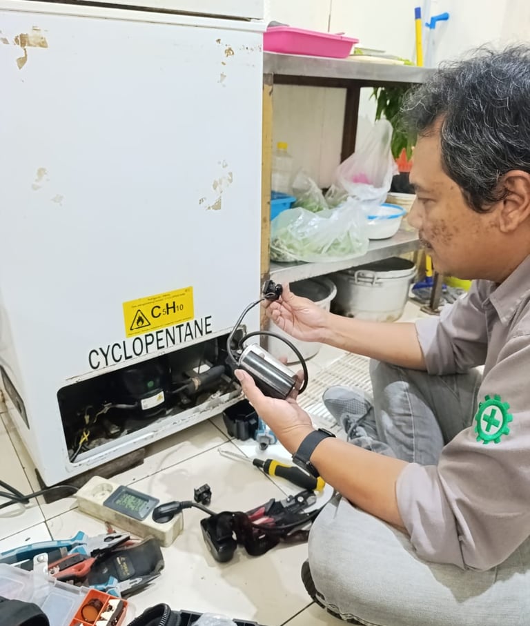 service freezer surabaya