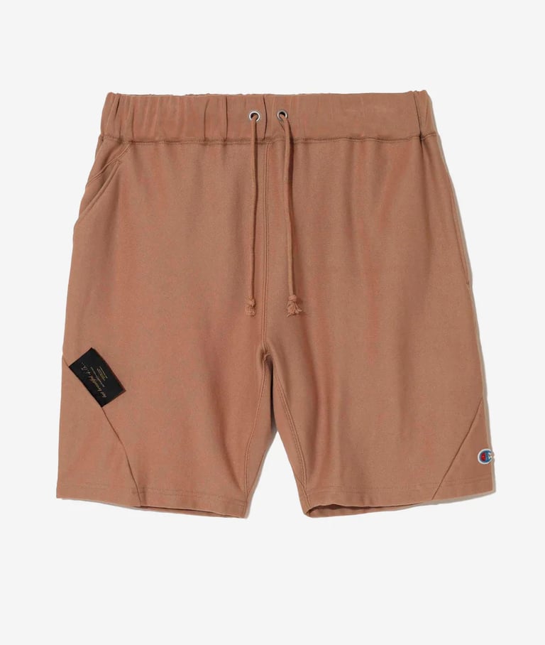 beige sports shorts champion
