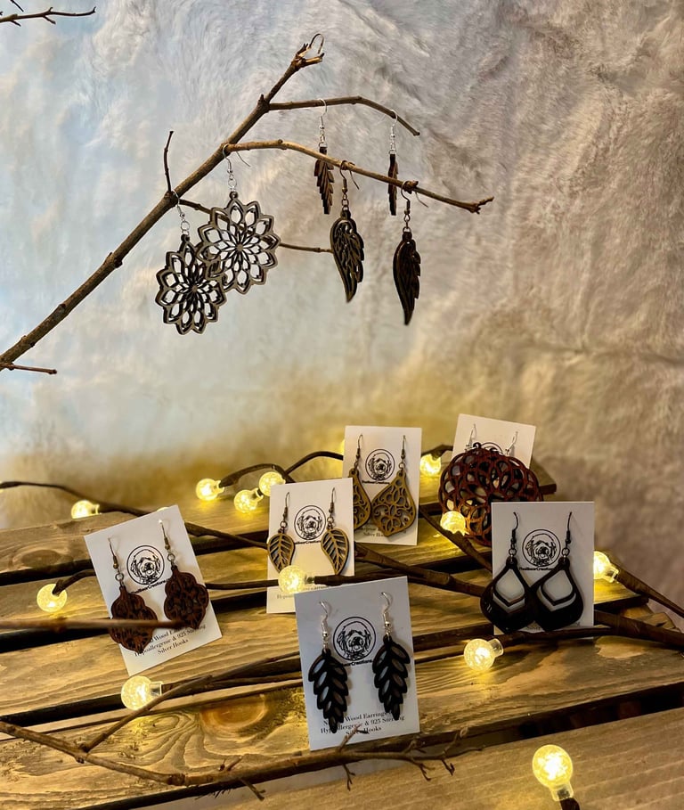 a table with custom wood earrings