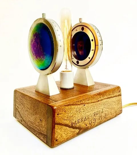 Custom light made from blown glass, foundry mold and gauges.