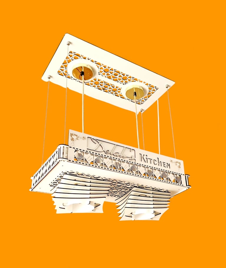 Modern white wooden kitchen chandelier with intricate laser-cut patterns and hanging pendant lights.