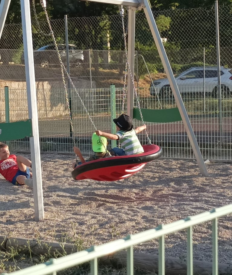 Smaller children play