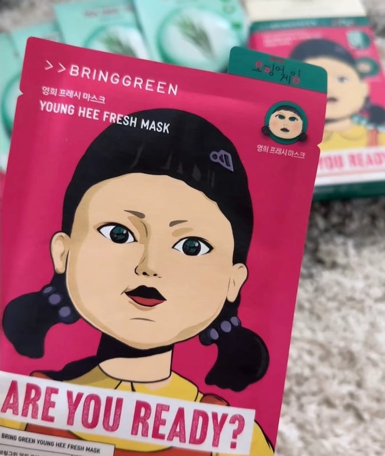 Bring Green Young Hee Fresh Mask sheet featuring the iconic Squid Game doll character on pink packaging.