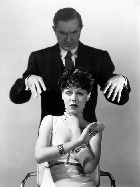 Bela Lugosi menaces a victim