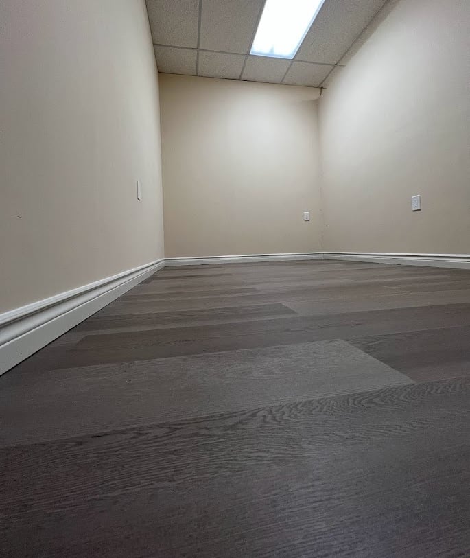 a room with a ceiling fan and a ceiling fan