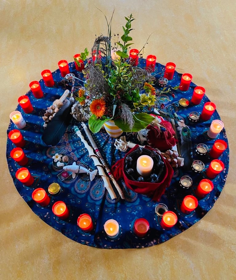 An Altar with a candle and Flowers