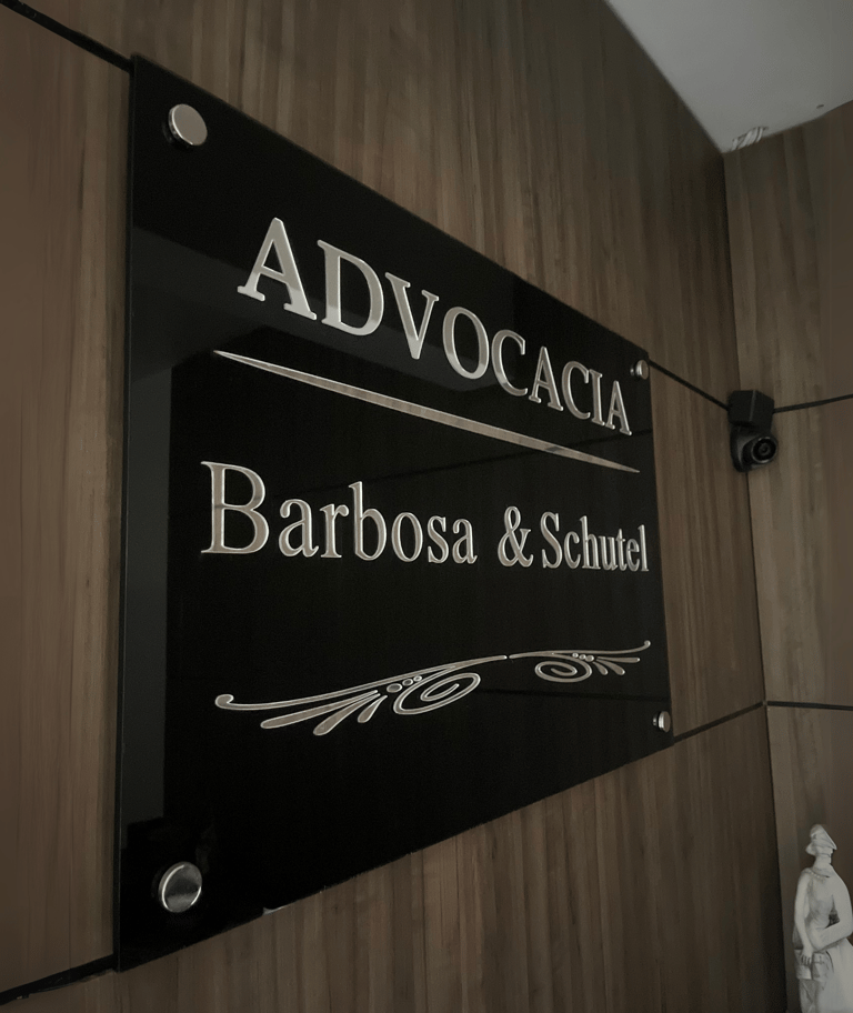 Foto da placa física da Advocacia Barbosa & Schutel