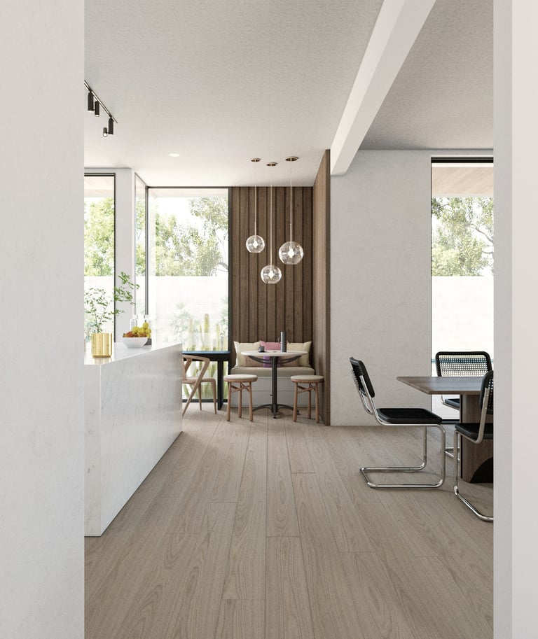 Une cuisine moderne avec une table à manger et des chaises.
