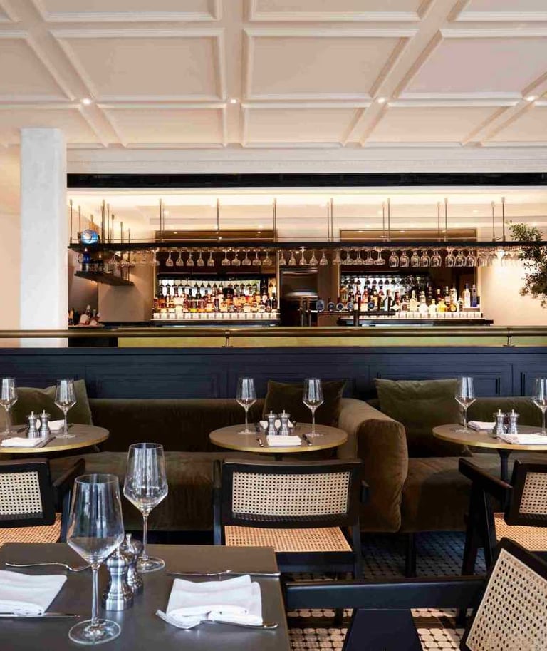 a restaurant with a bar and a bar with a bar