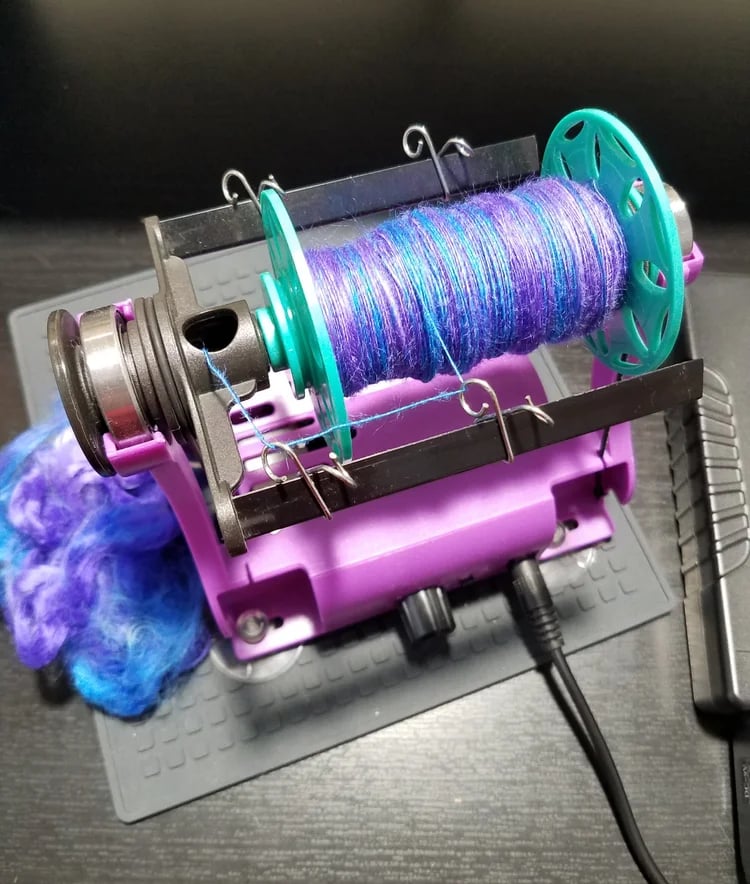 Photo of an automatic thread winder.