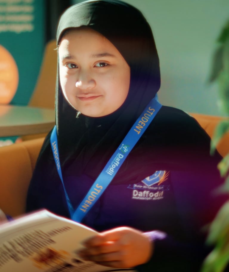 a woman in a black jacket and a blue ribbon