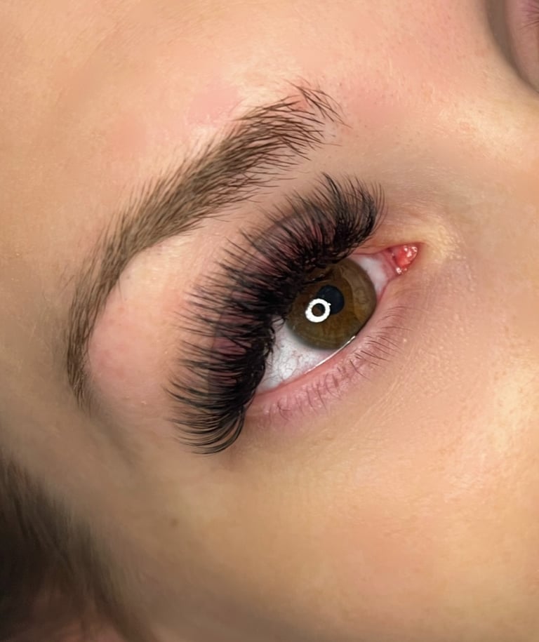 Full volume lash extensions with dense hand-made fans, in La Jolla