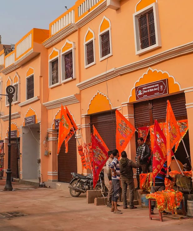 a group of people standing in front of a building