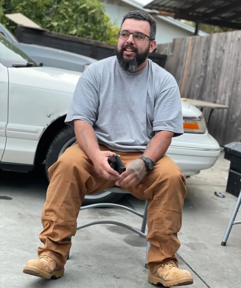 Sonoma Junkers co owner Luis sitting on a chair