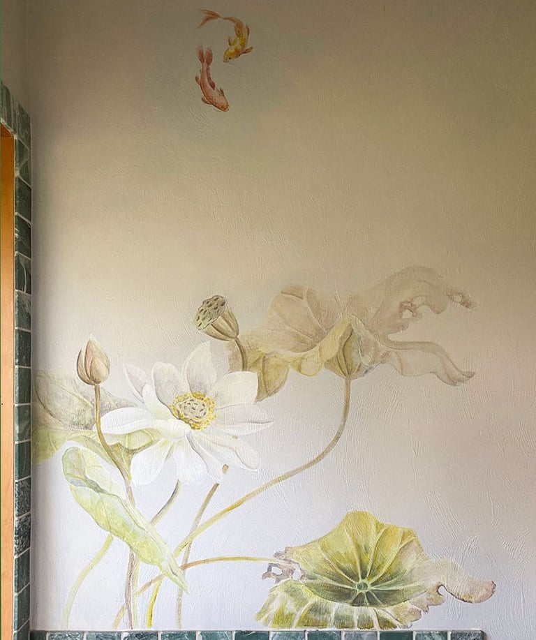 Dramatic mural with softly coloured lotus, foliage and koi in serene spa bathroom.