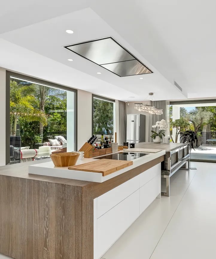 Modern white kitchen with island at Villa Serenity