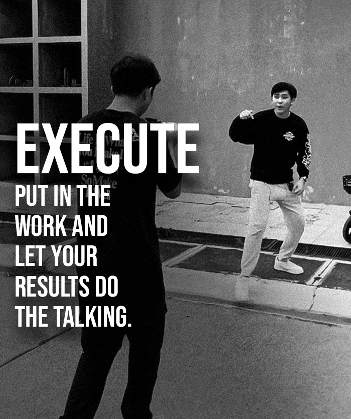 2 People shooting a content with a text about execute