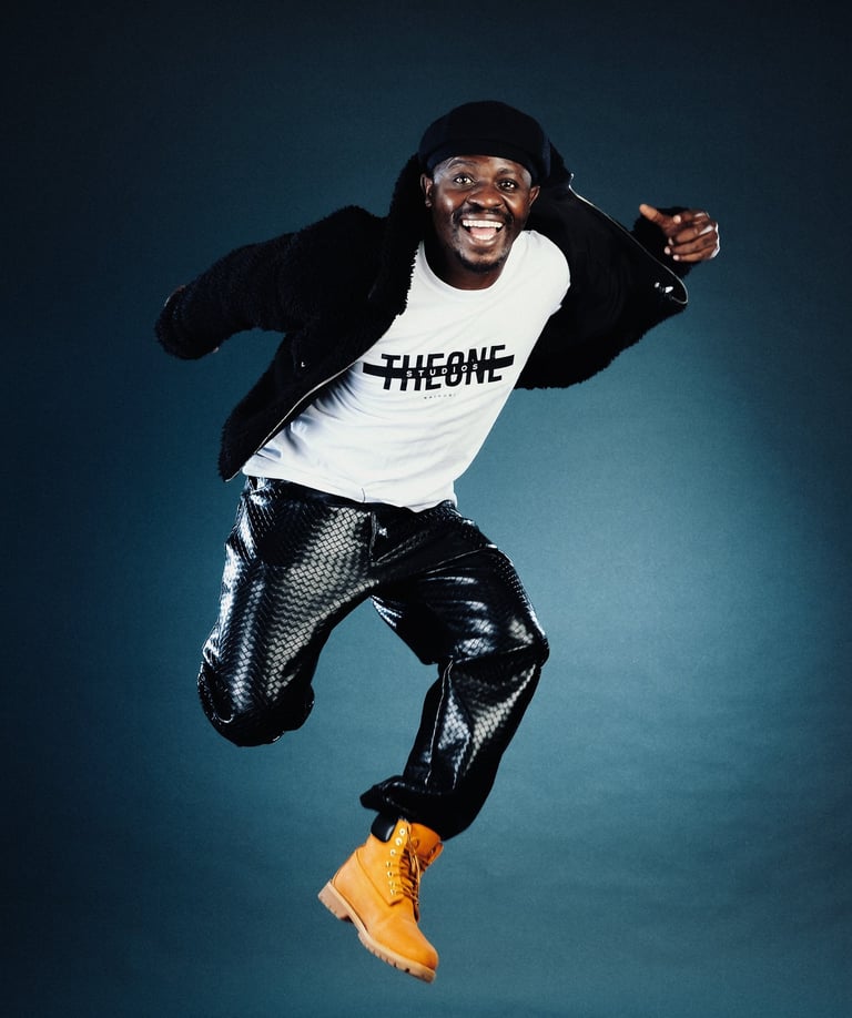 Chiluba, Kenyan dancer and founder of TheOne Studios in Nairobi, jumping in a photoshoot