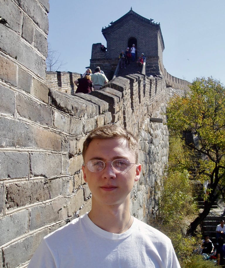 Dr. Hill at the Great Wall in China