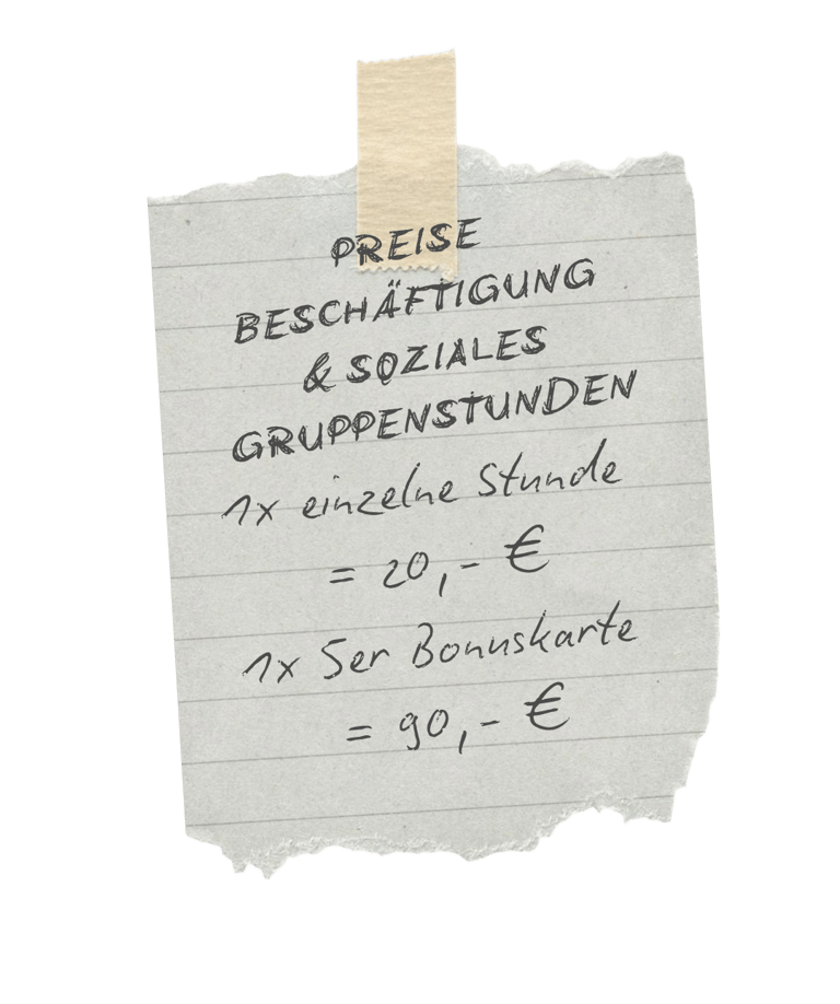 Price list for puppy and young dog training groups on a taped note with handwritten costs.