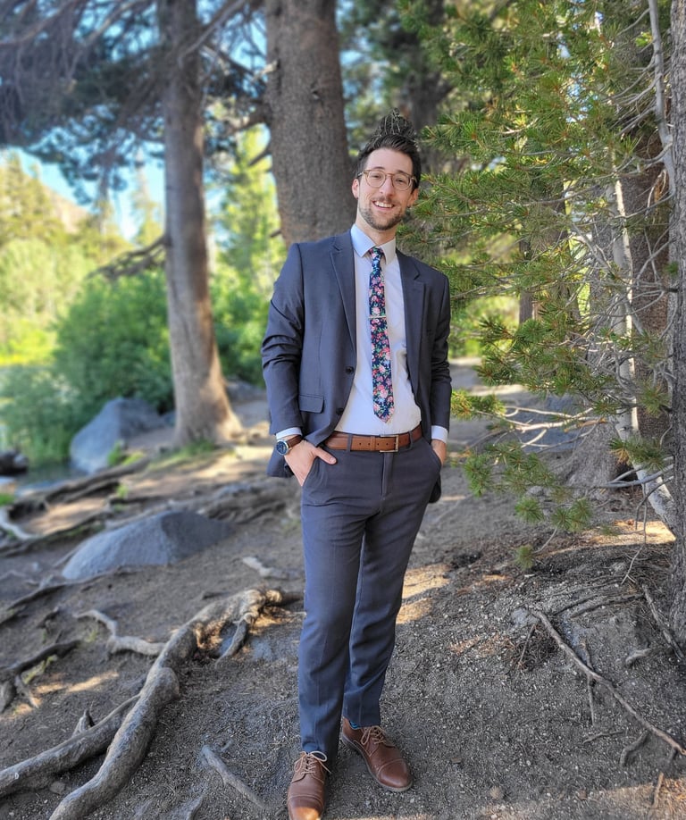 Daniel Medina in a gray suit, Placer County, Roseville