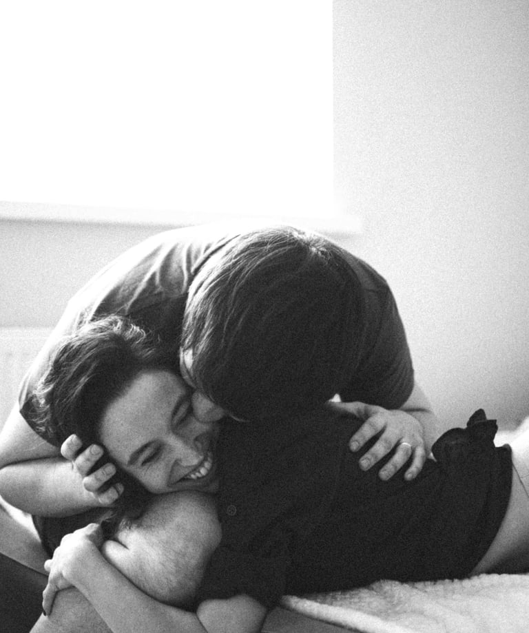 a man and woman who met on piano piano, kissing on a bed
