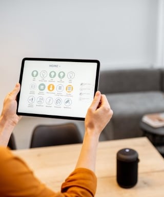 home automation, woman holding a tablet