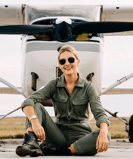 Private Pilot sitting before Plane