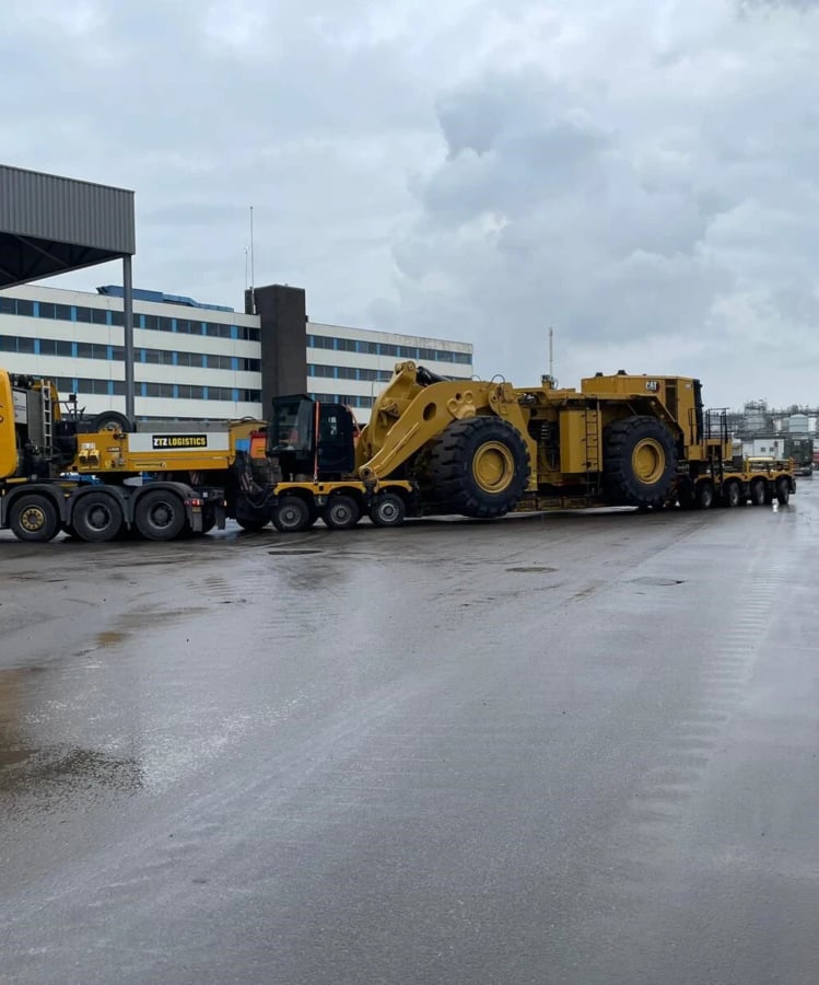a large truck with a large loader on it