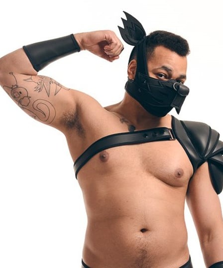 man in animal play wolf mask with ears and gladiator armor