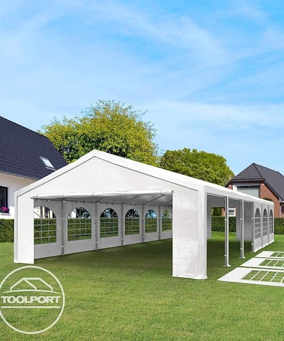 a white tent with a white canopy and a white tent