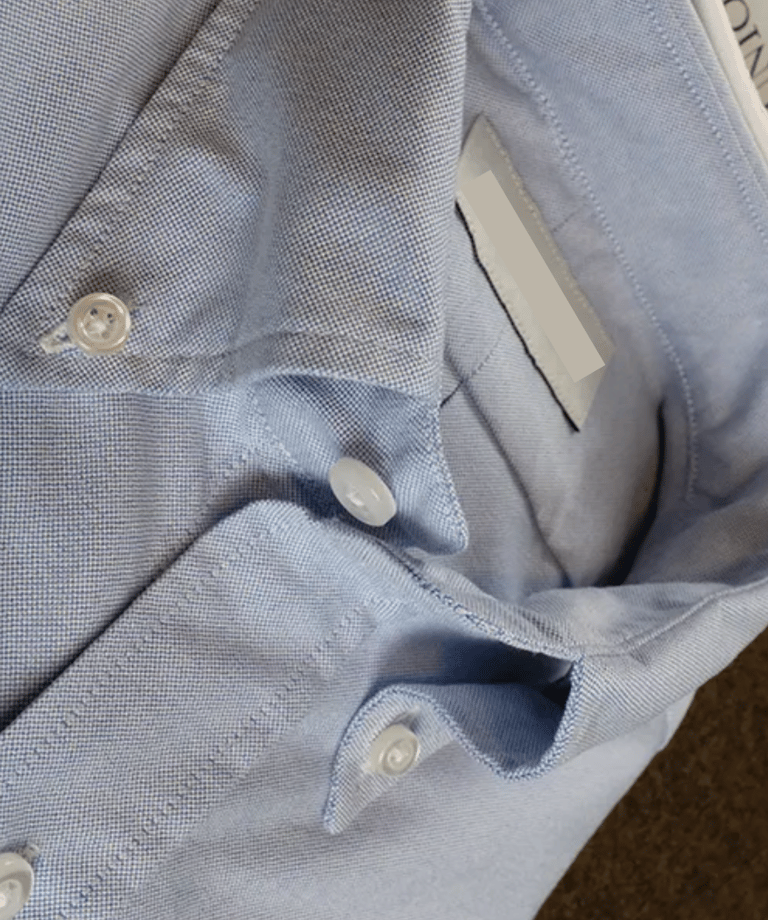 a dress shirt in a light blue color Oxford cloth button-down style