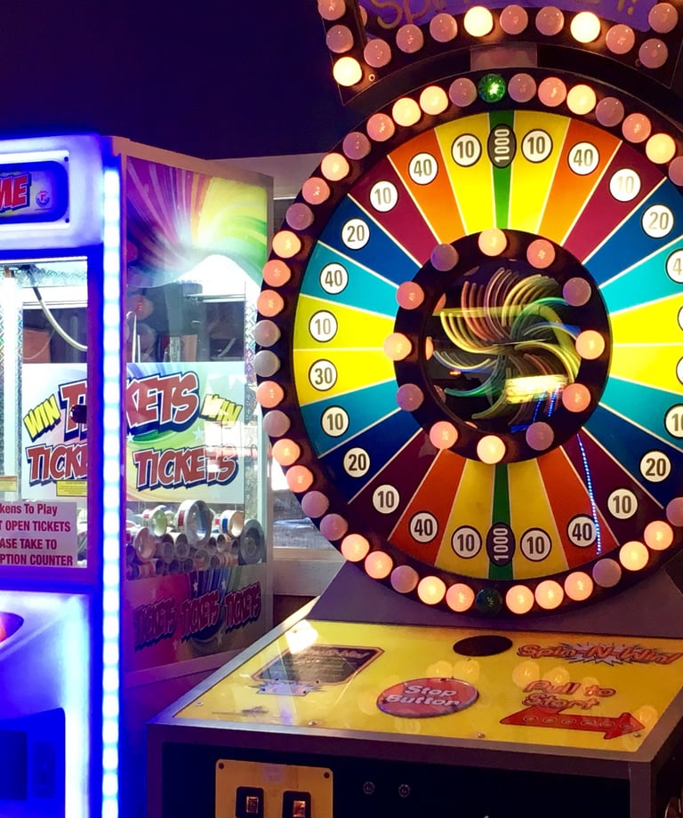 arcade game with wheel and bright lights
