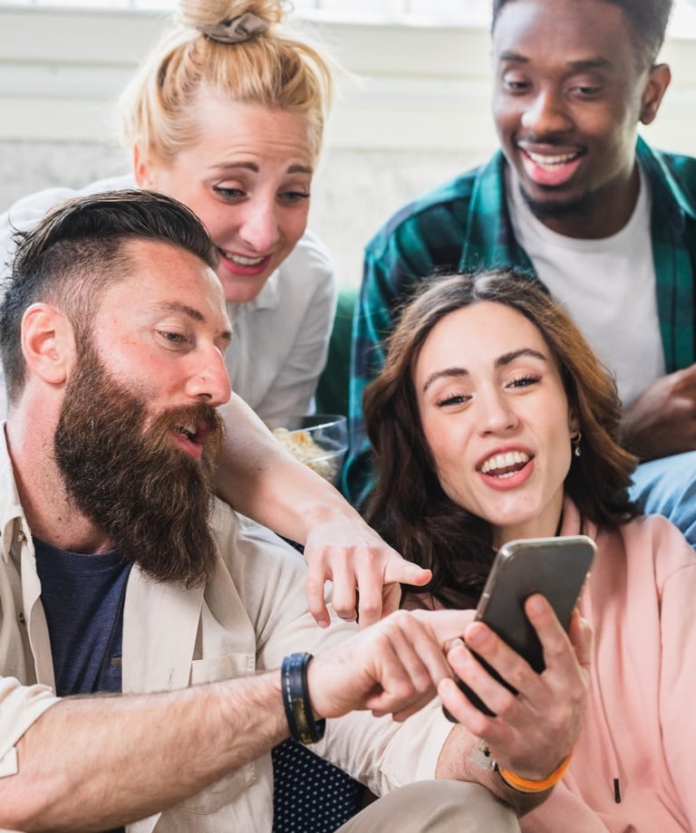 a group of people sitting on a couch with a man and woman