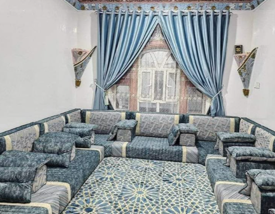 a living room with a couch and a couch