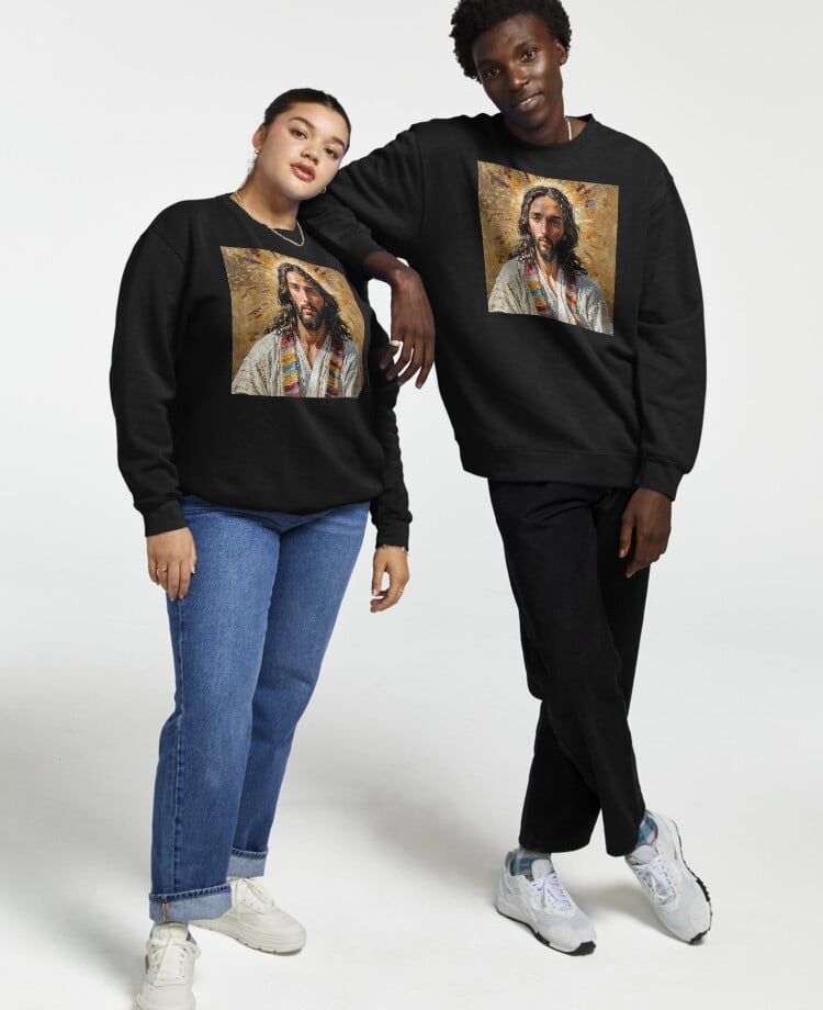 a man and woman wearing black sweatshirts and jeans