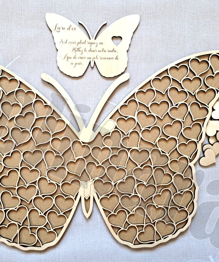 a butterfly butterfly butterfly cut out of wood