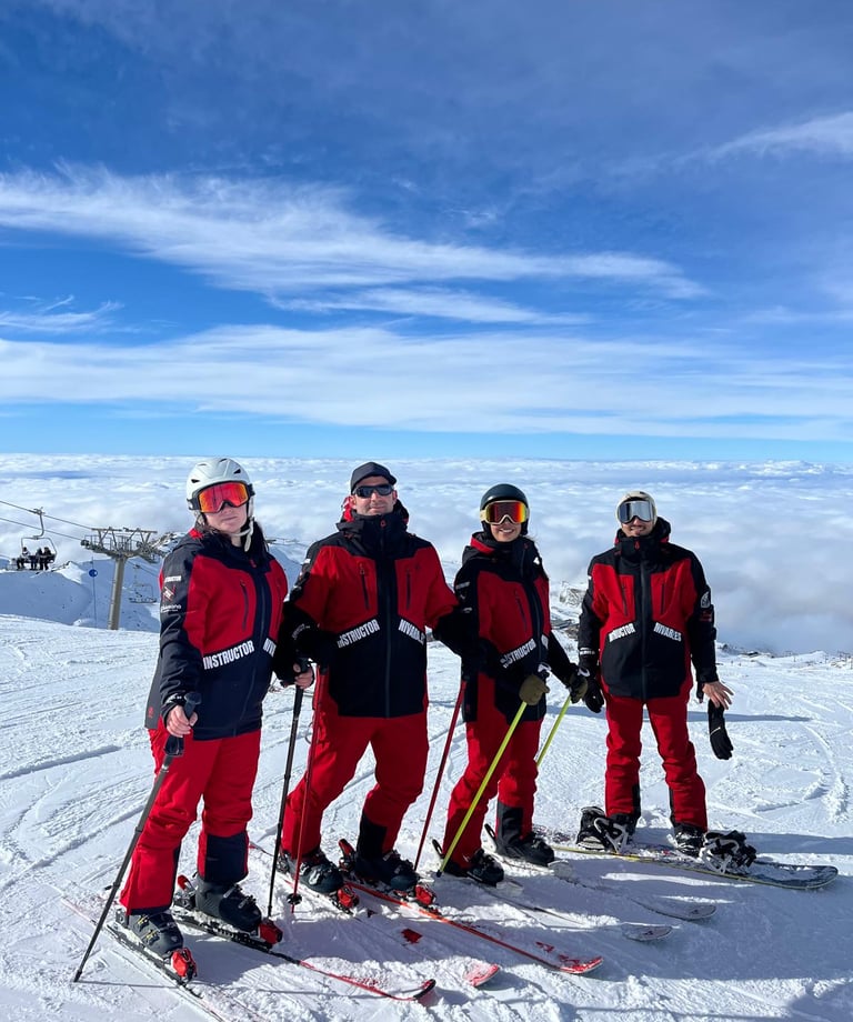 a group of skiers posing for a picture