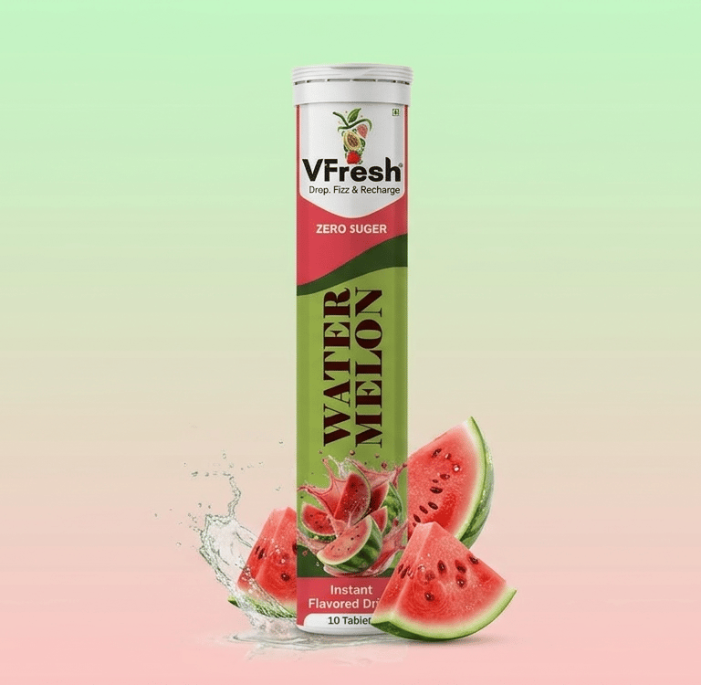 VFresh watermelon flavored effervescent drink tablets tube with fresh fruit slices and water splash.