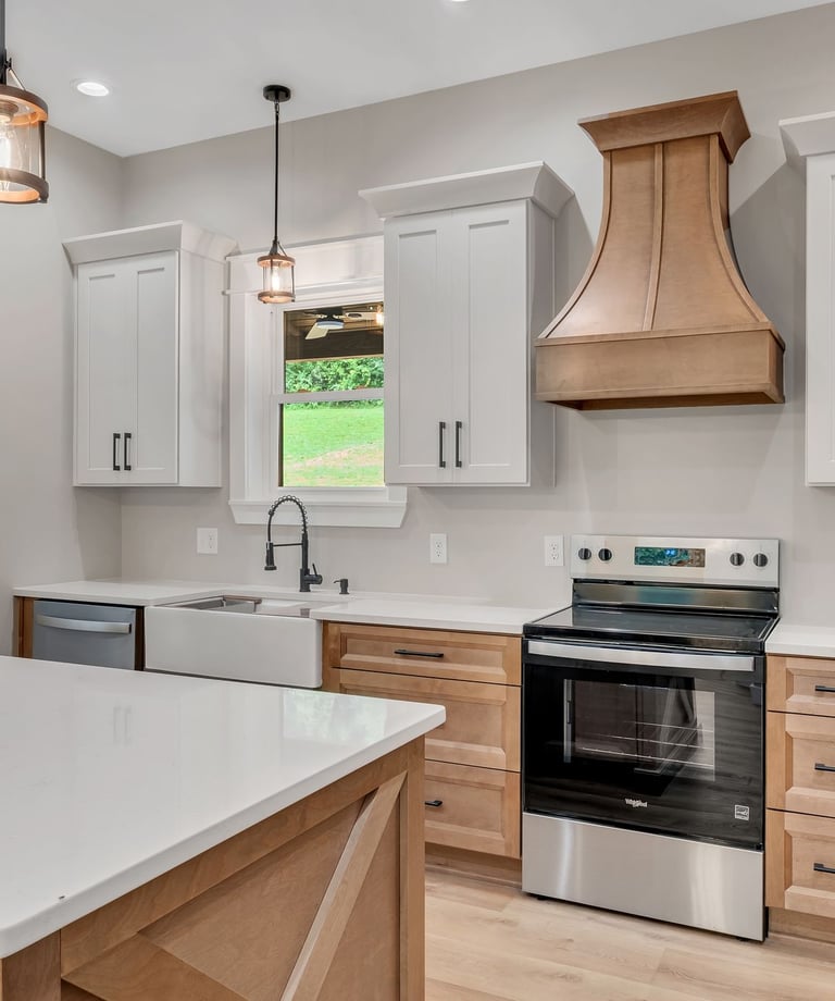 Kitchen vent and beautiful design of new construction home