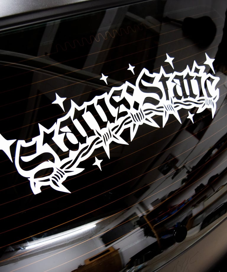 a car with a sticker on the back of it