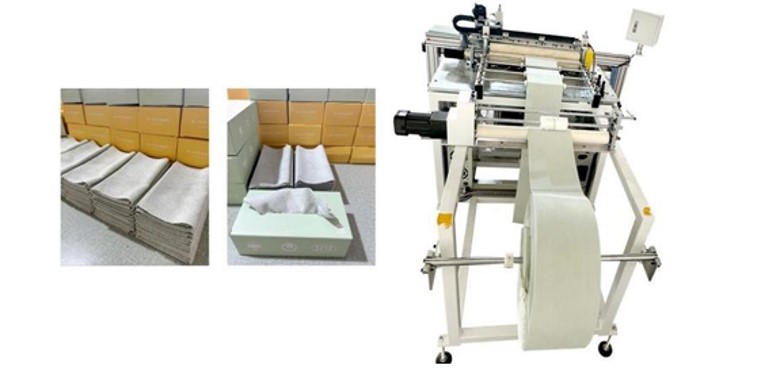 Hand towel cutting and folding machine