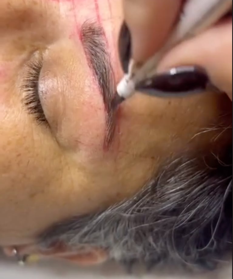 a woman with a black eyeliners and a black eyeliners
