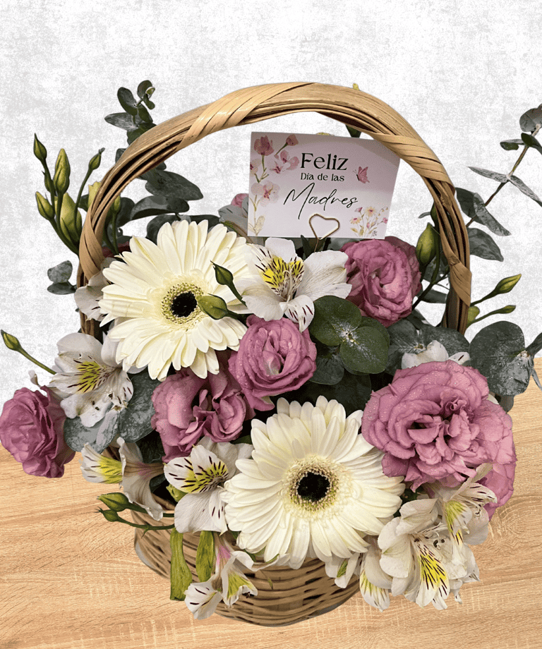 Canasta floral con lisianthus, gerberas, dolar y astromela en tonos rosa y blanco