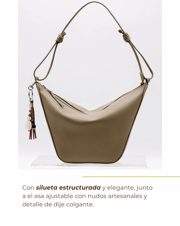 a purse with a tassell and a tassell