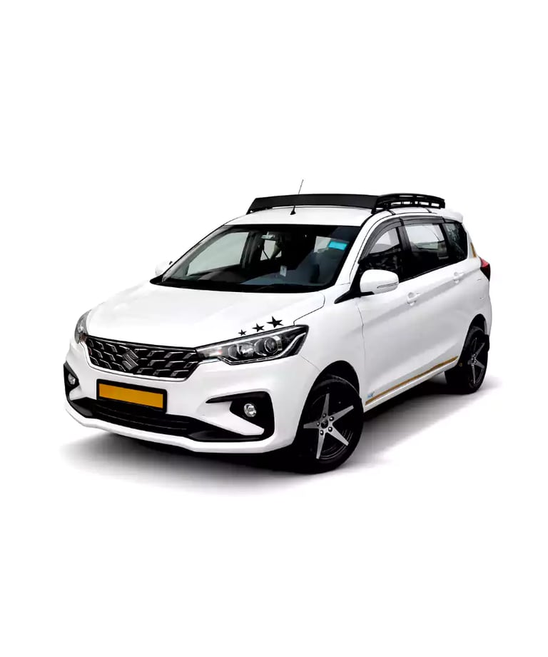 White Maruti Ertiga one way taxi by Saini taxi services with a luggage carrier rack