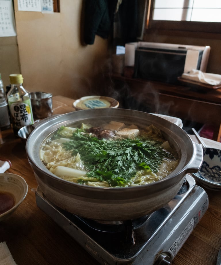 Steaming Japanese hot pot with tofu and leafy greens simmering in a clay nabe pot.